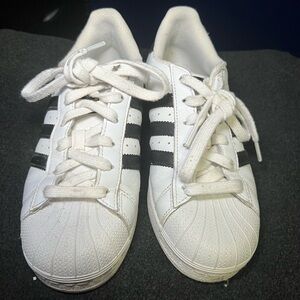 Classic White Sneakers with Black Stripes